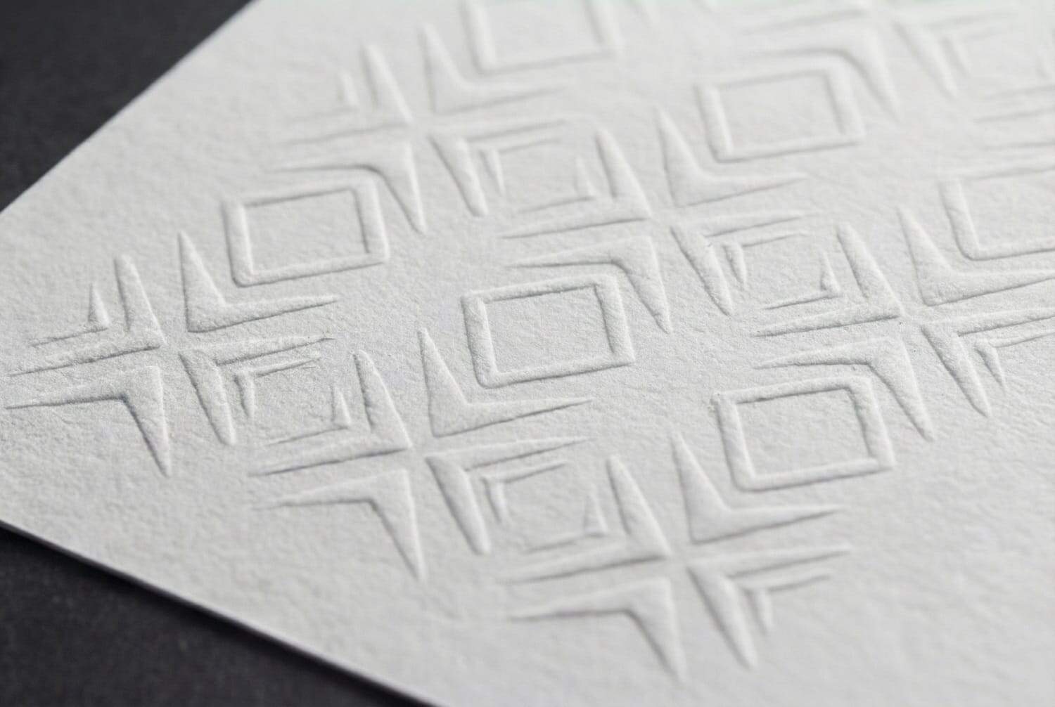 3D blind embossing texture creating a raised tactile pattern without ink for elegant branding